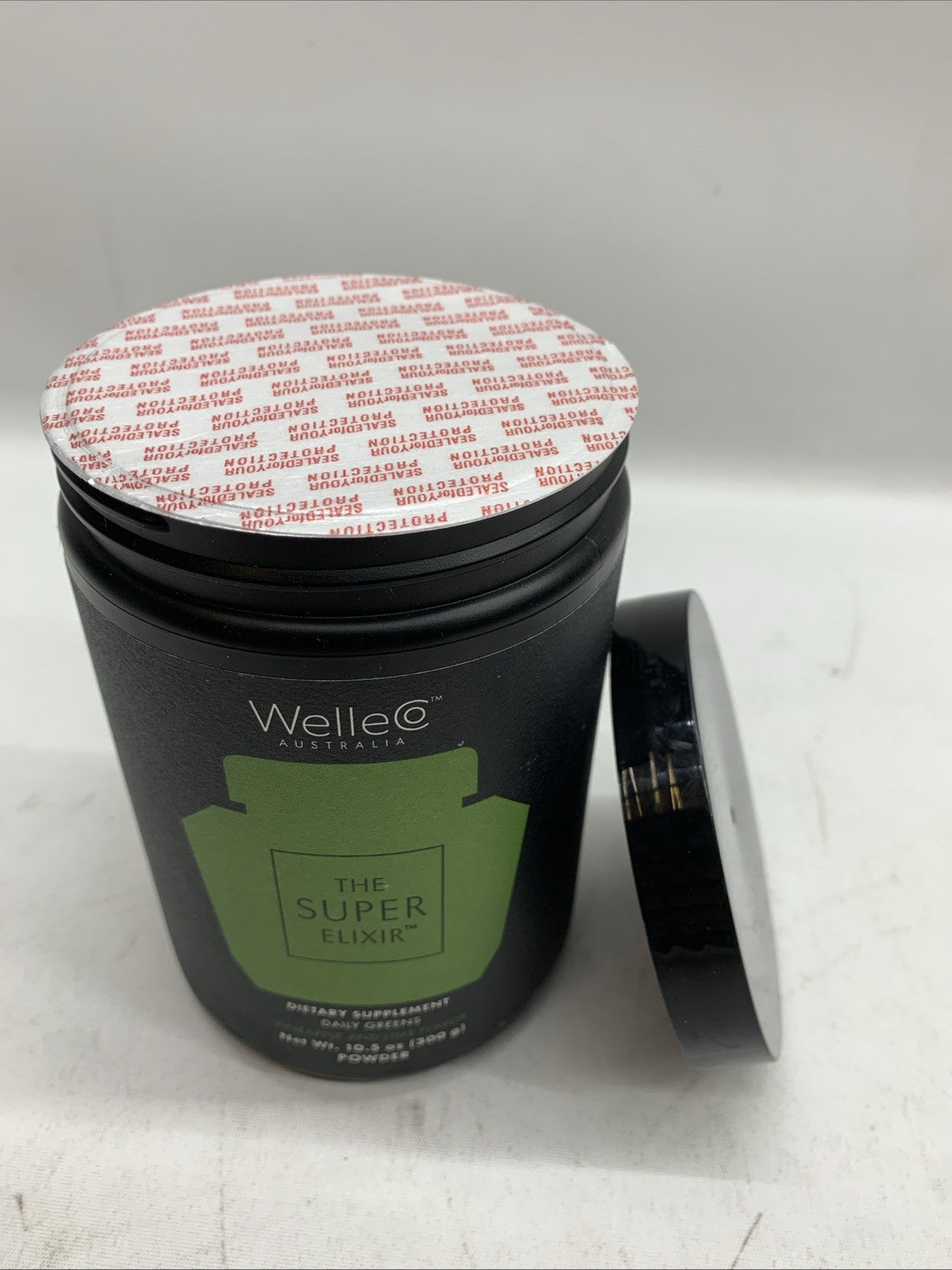 WelleCo Super Elixir Greens Powder Supplement Pineapple/Lime 10.5oz EXP 2/27