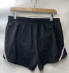 Black and lavender Under Armor Women's Fly By lined loose running shorts, size M, activewear shorts for women.