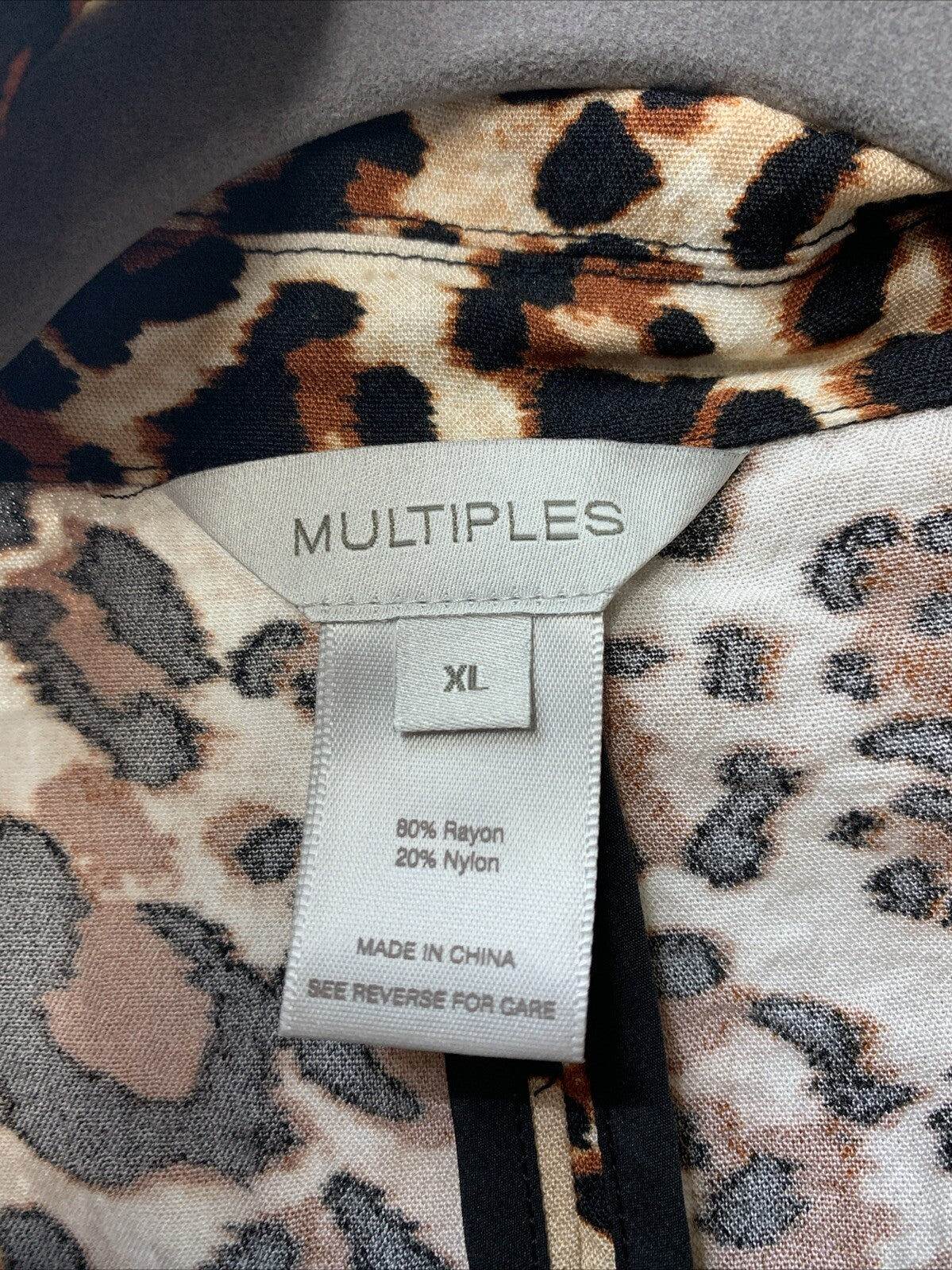 Women's XL MULTIPLES jacket shirt with 3/4 sleeves, lapel collar, and front welt pockets, in a stylish, casual design.