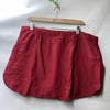 Red plus size high-waisted swim skirt by Hanna Nikole, size 22W, with a modest coverage design, suitable for women's swimwear.