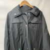Black London Fog women's trench coat with hood, long sleeves, and pockets, displayed on a hanger.
