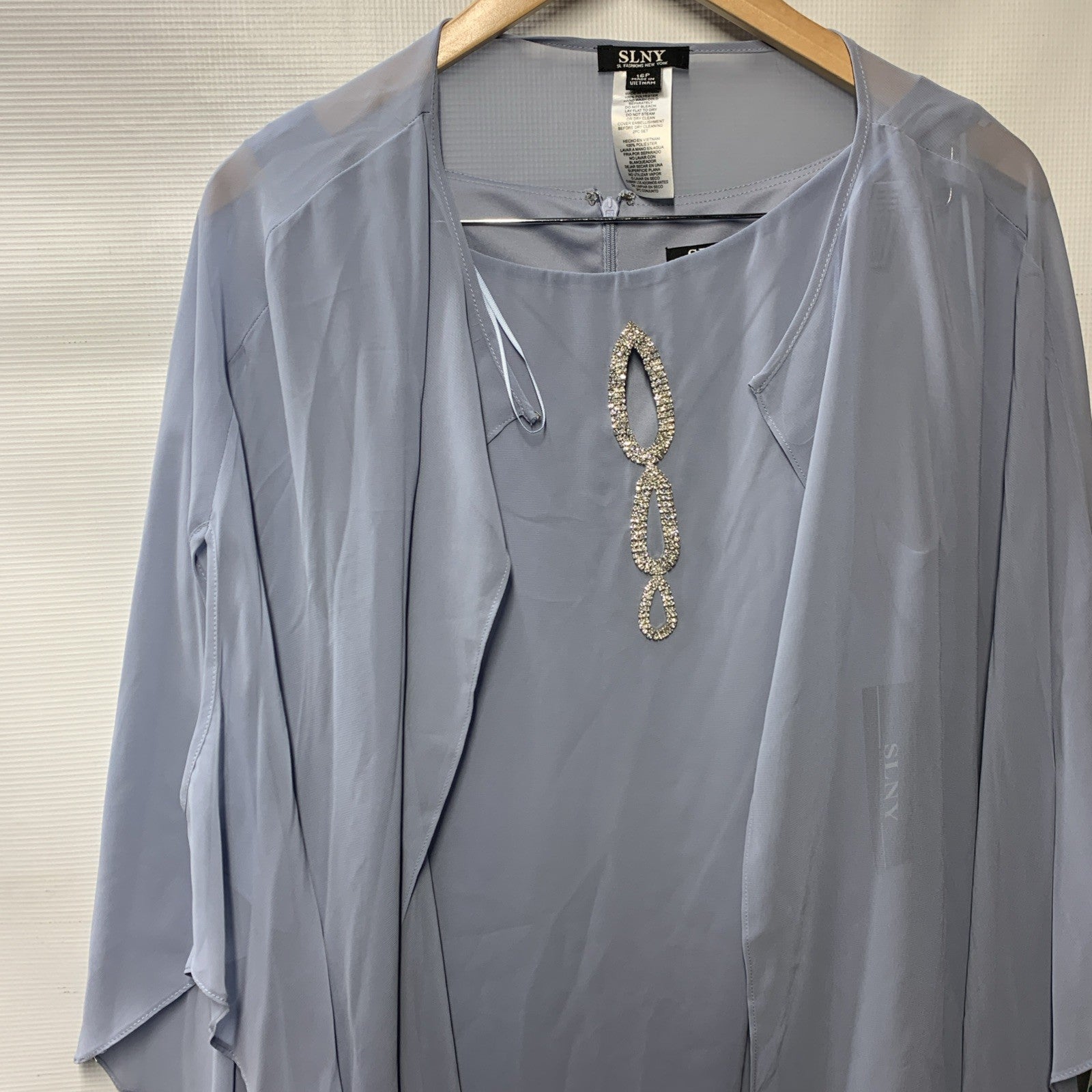 Light blue women's sheath dress with chiffon capelet for party wear, size 16P, by SLNY Fashions.