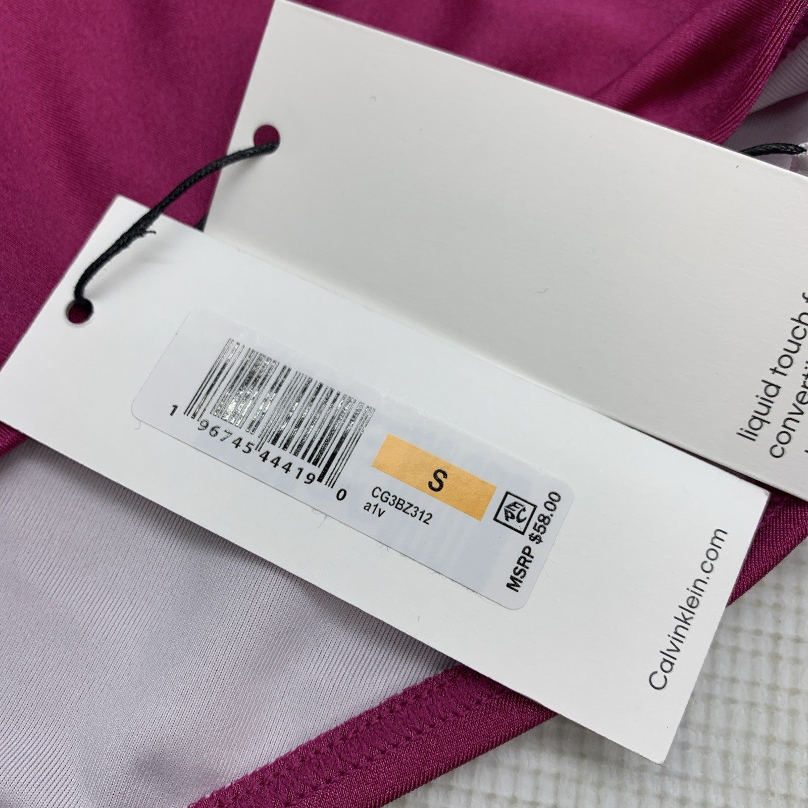Fuchsia shimmer Calvin Klein women's convertible swim bottom swimsuit in size S, shown with adjustable fit and stylish design.