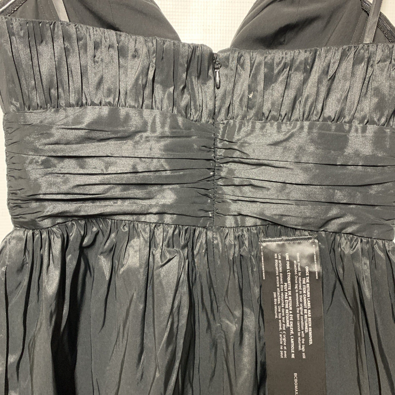 Black BCBGMAXAZRIA mini strapless ruched evening dress for women, size 6, with a fitted, elegant design.