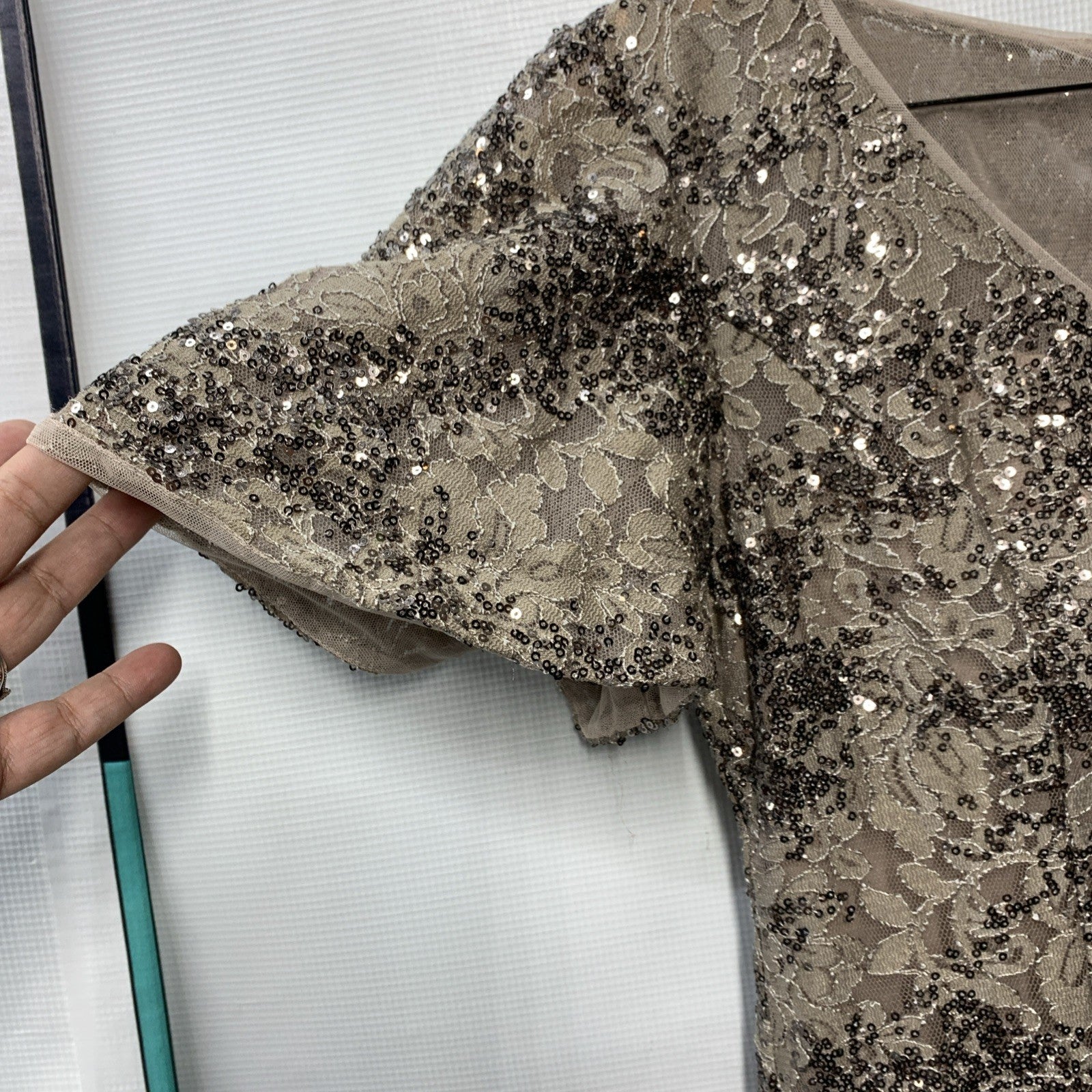 Taupe Alex Evenings long rosette mother of the bride dress, size 8, featuring elegant floral embellishments and a flowing silhouette.