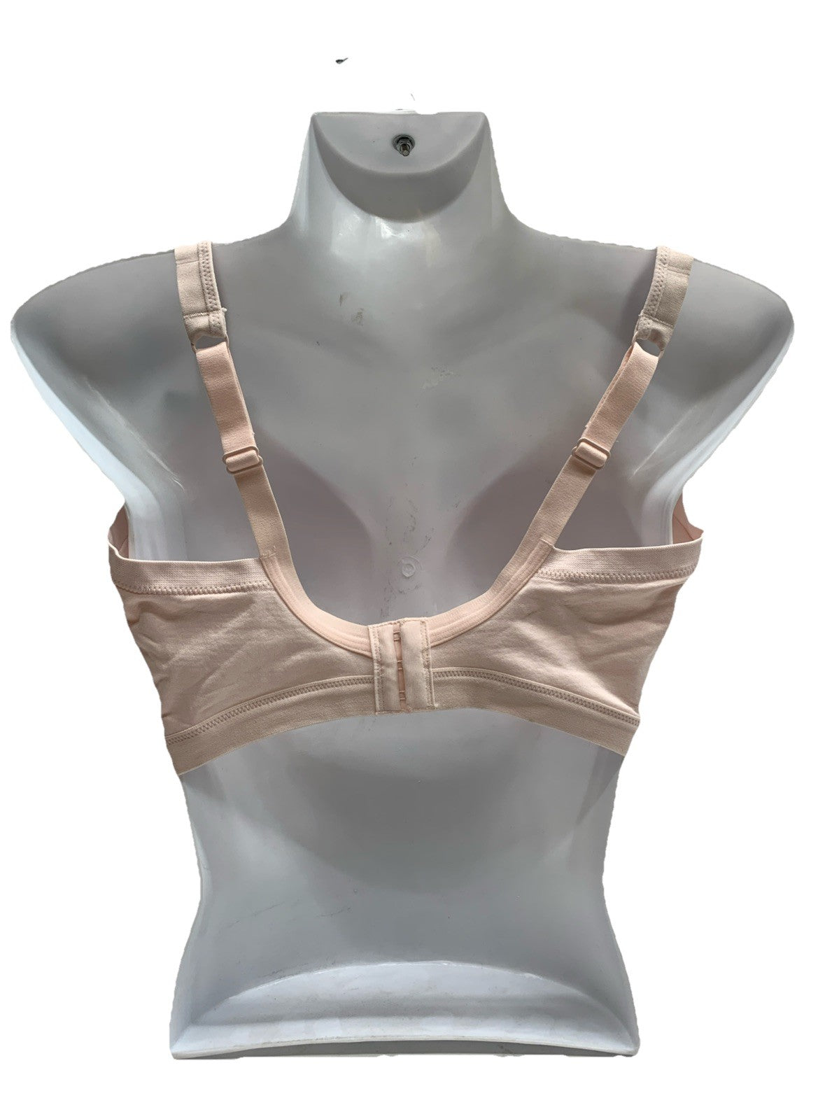 Light beige Warners women's wireless bra with seamless, lightly lined design, soft fabric, and comfortable fit.