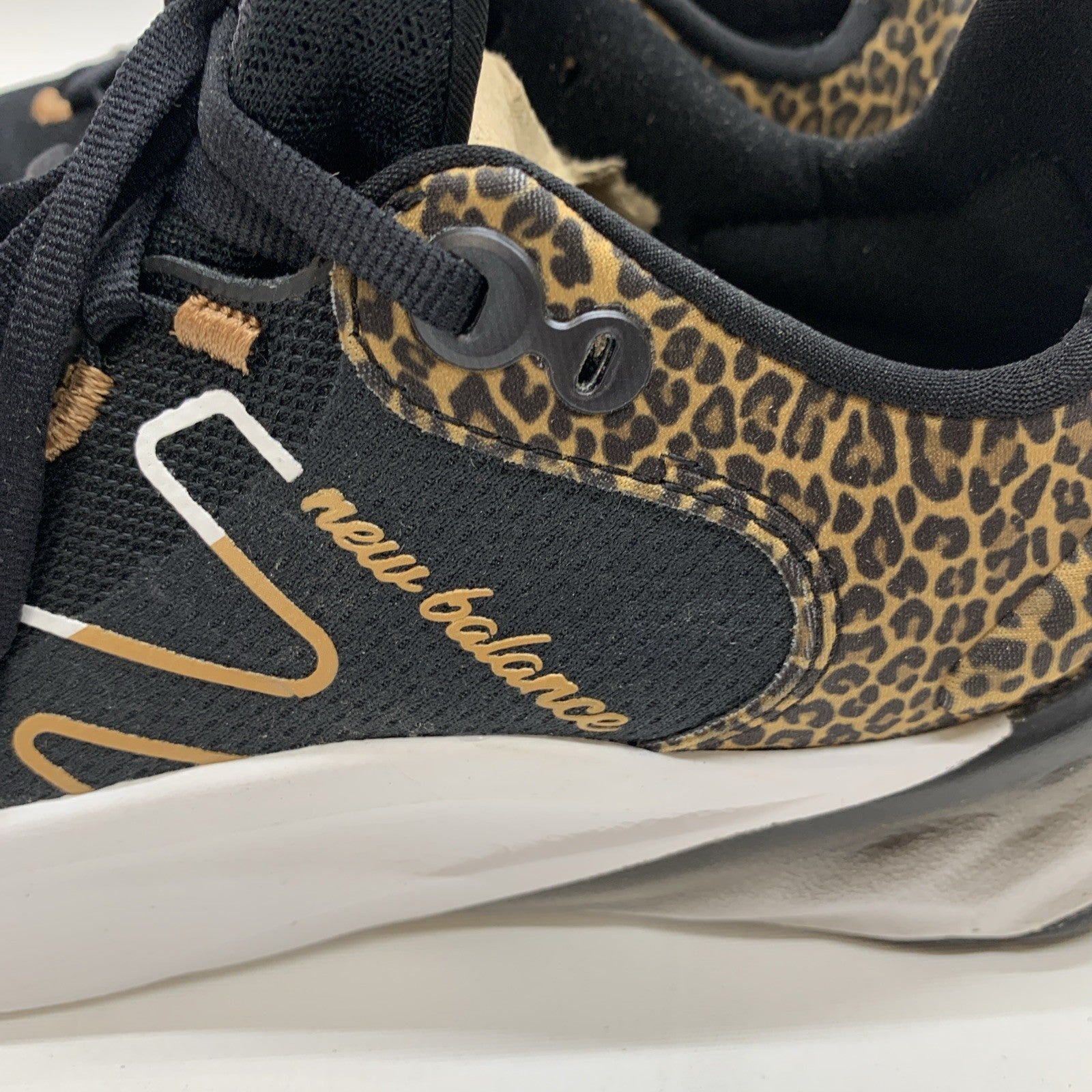 New Balance Women's Fresh Foam Roav V2 Sneaker Black /White/Leopard Print 7.5