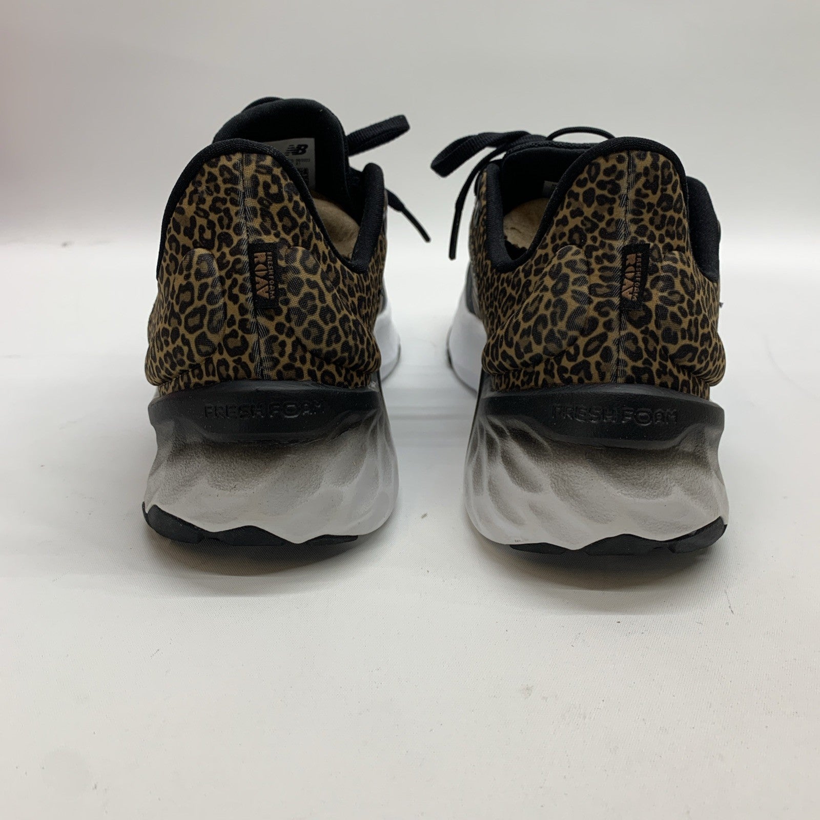 New Balance Women's Fresh Foam Roav V2 Sneaker Black /White/Leopard Print 7.5