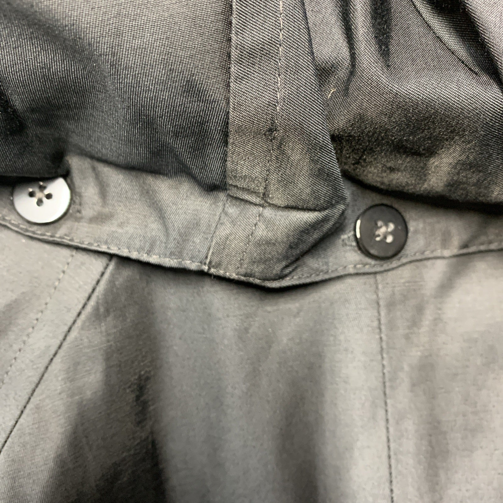 London Fog women's black trench coat with hood, long sleeves, and pockets, featuring a classic design and medium size.