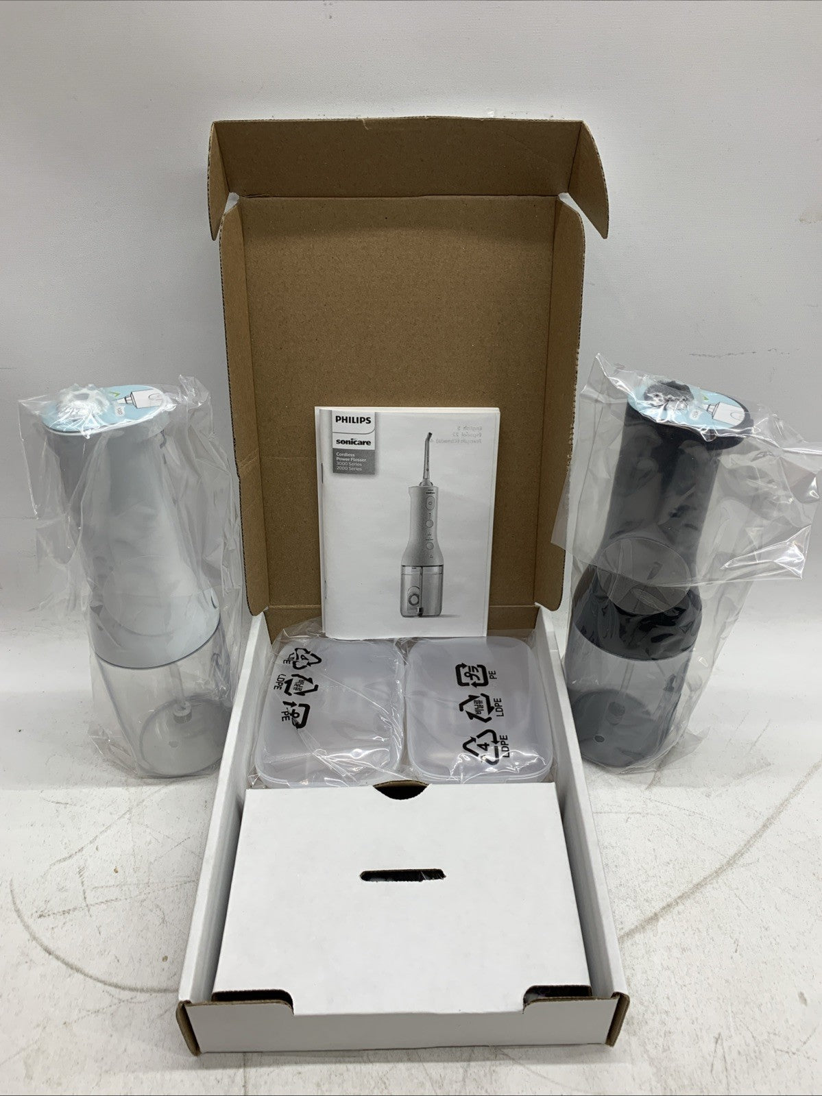 Philips Sonicare Cordless Power Flosser Dual Pack Black & White Oral Irrigator