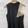 Black Donna Morgan sleeveless evening dress with asymmetrical cutout and high slit, size 8, styled for elegant occasions.