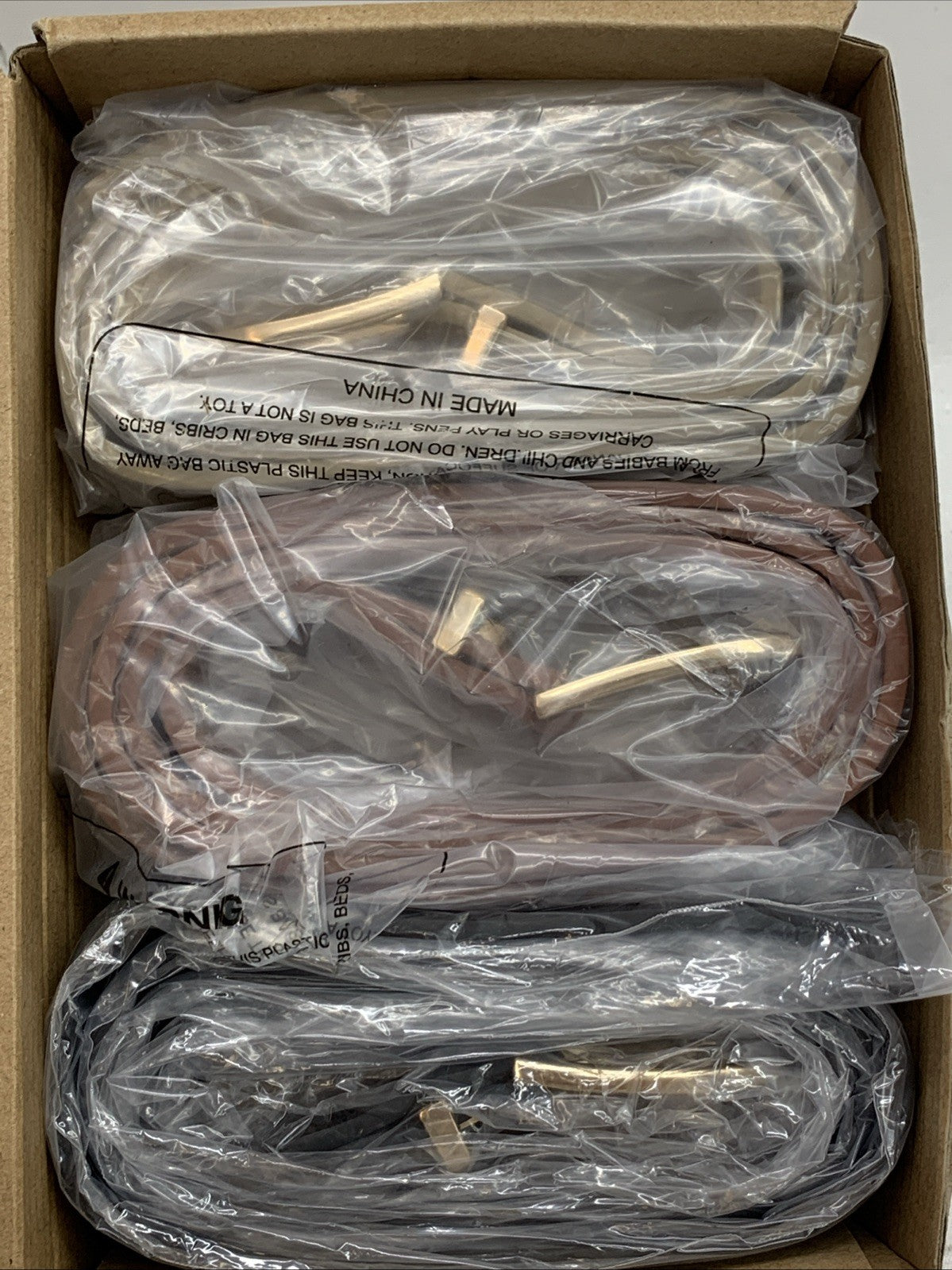 Three women's leather belts with gold buckles from The Family Flips, styled for jeans, dresses, and pants, in a 3-pack.