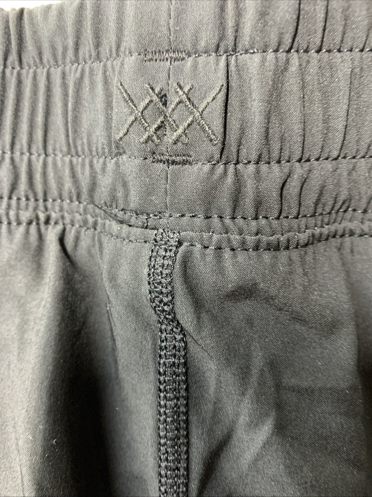 Rhone men's black XL activewear shorts with Mako lining, stretch fabric, drawstring waist, and anti-odor feature.