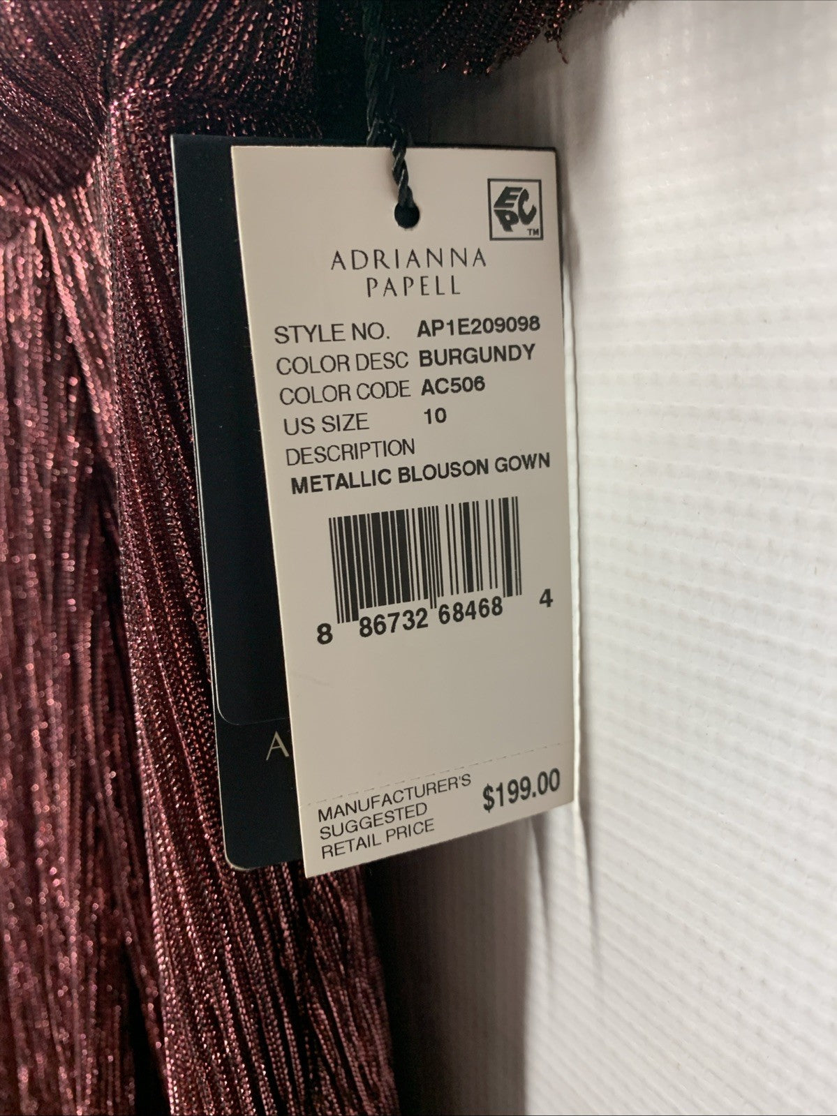 Burgundy Adrianna Papell metallic blouson gown for women, elegant special occasion dress, size 10, with shimmering fabric and flowing design.