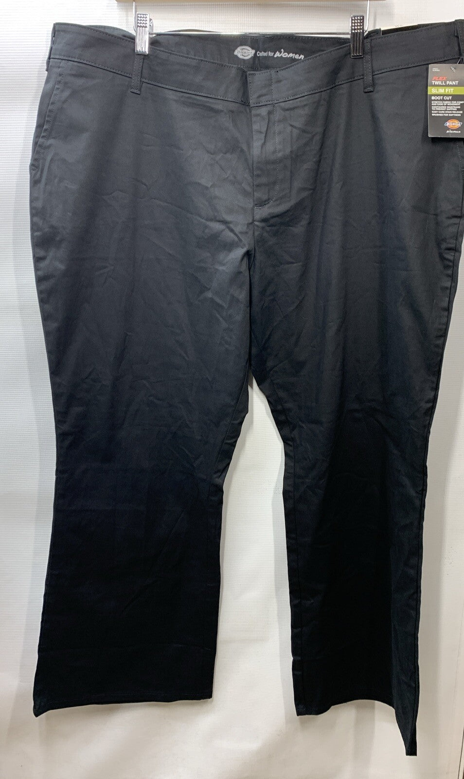 Black women's Dickies flat front stretch twill long pants in size 24 regular, shown in desert black color.
