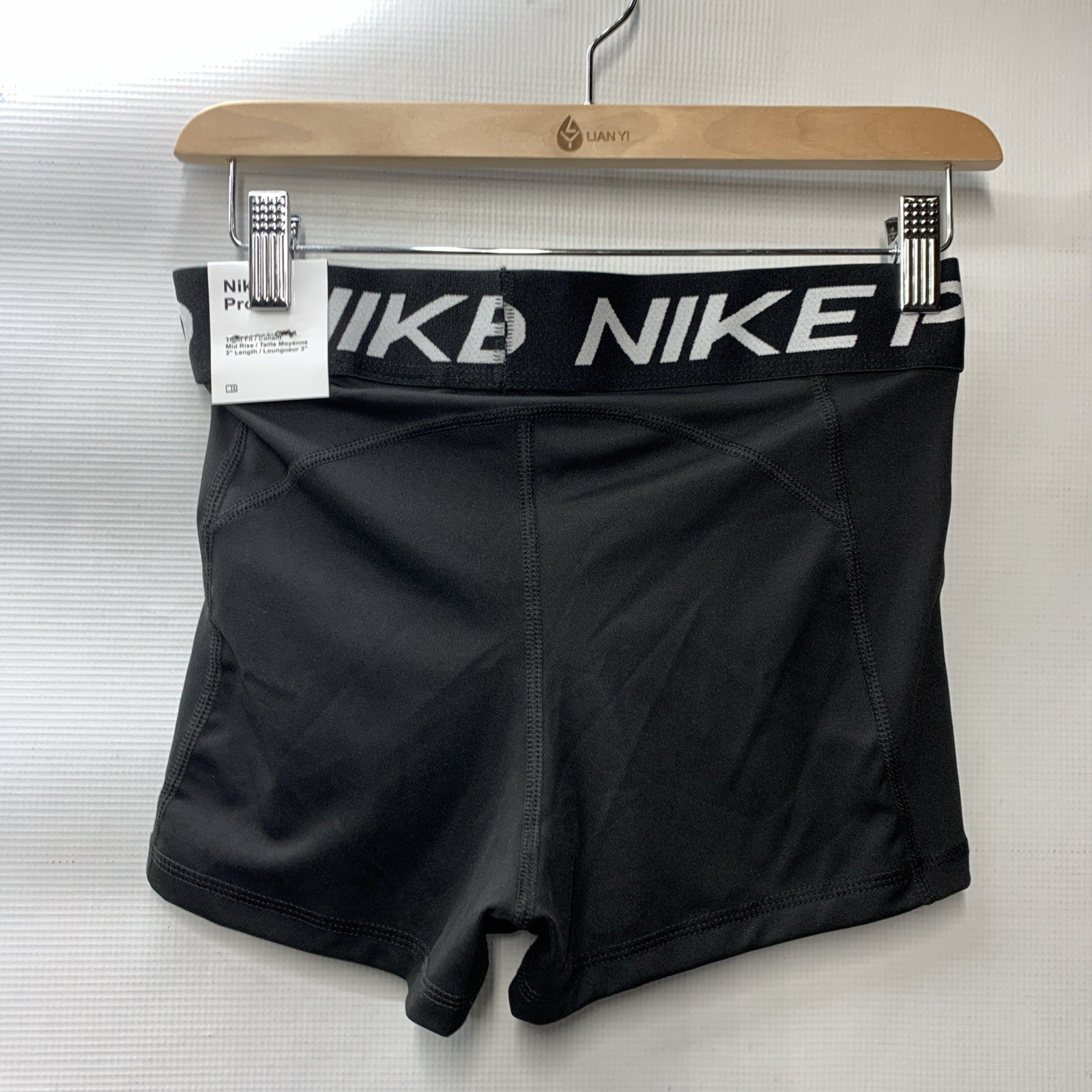 Nike Women's Pro 3-inch black training shorts with a tight fit and mid-rise waistband, size M, from The Family Flips.