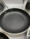 Deluxe 13-piece hybrid ceramic nonstick stainless steel cookware set by The Family Flips, including various pots and pans for kitchen use.