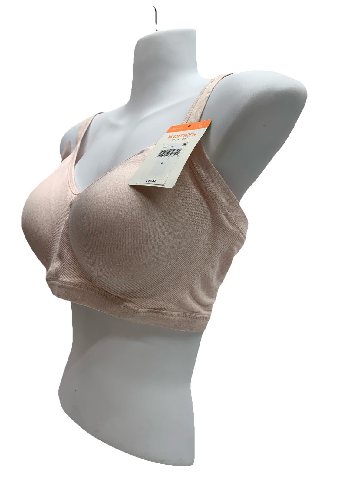 Light beige Warner's women's wireless seamless bra with light lining, designed for comfort and support in a large size.