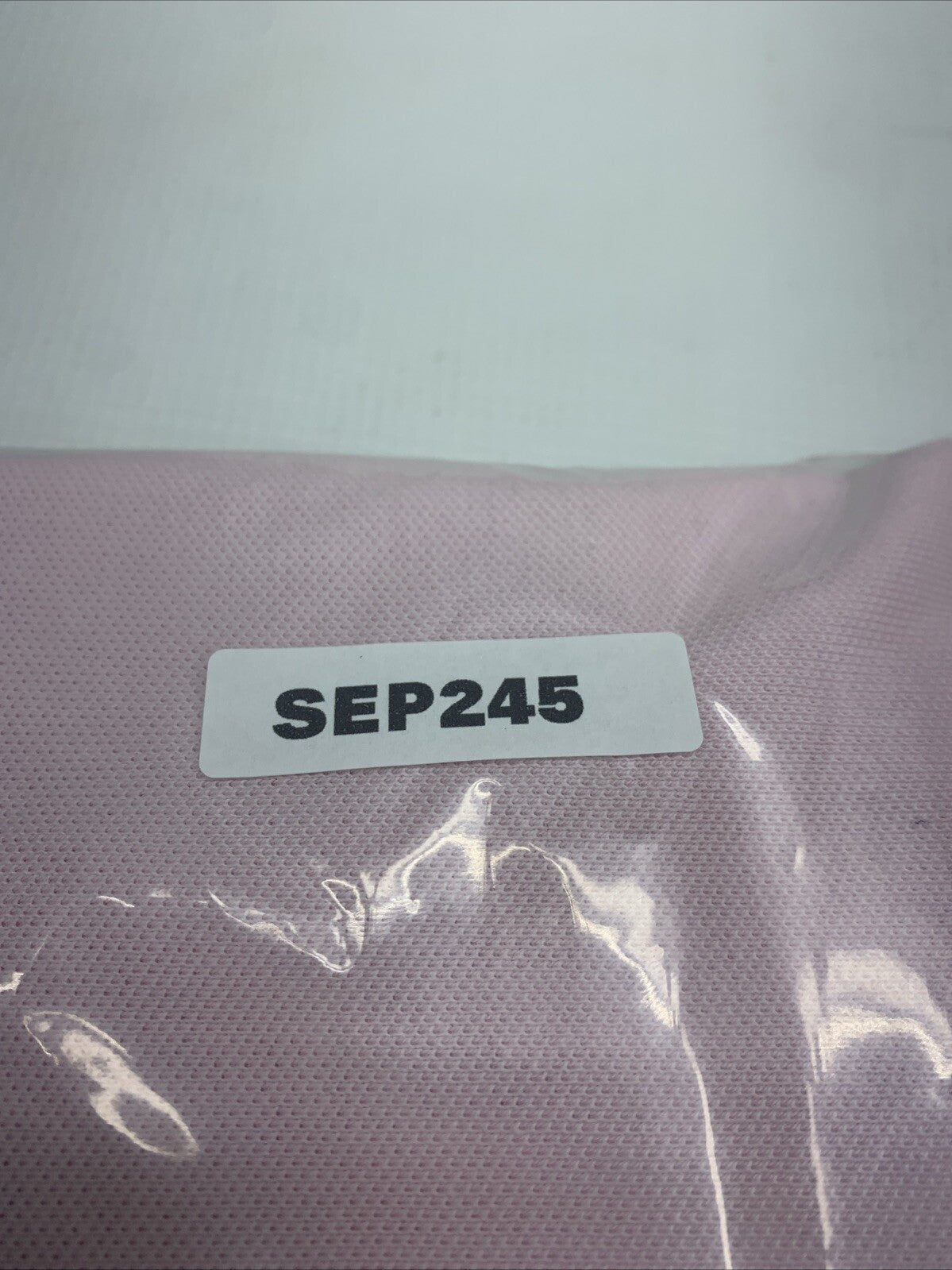 Nautica women's pink short sleeve cotton polo shirt with 5 buttons, size M, featuring a classic fit and Aloha pink color.