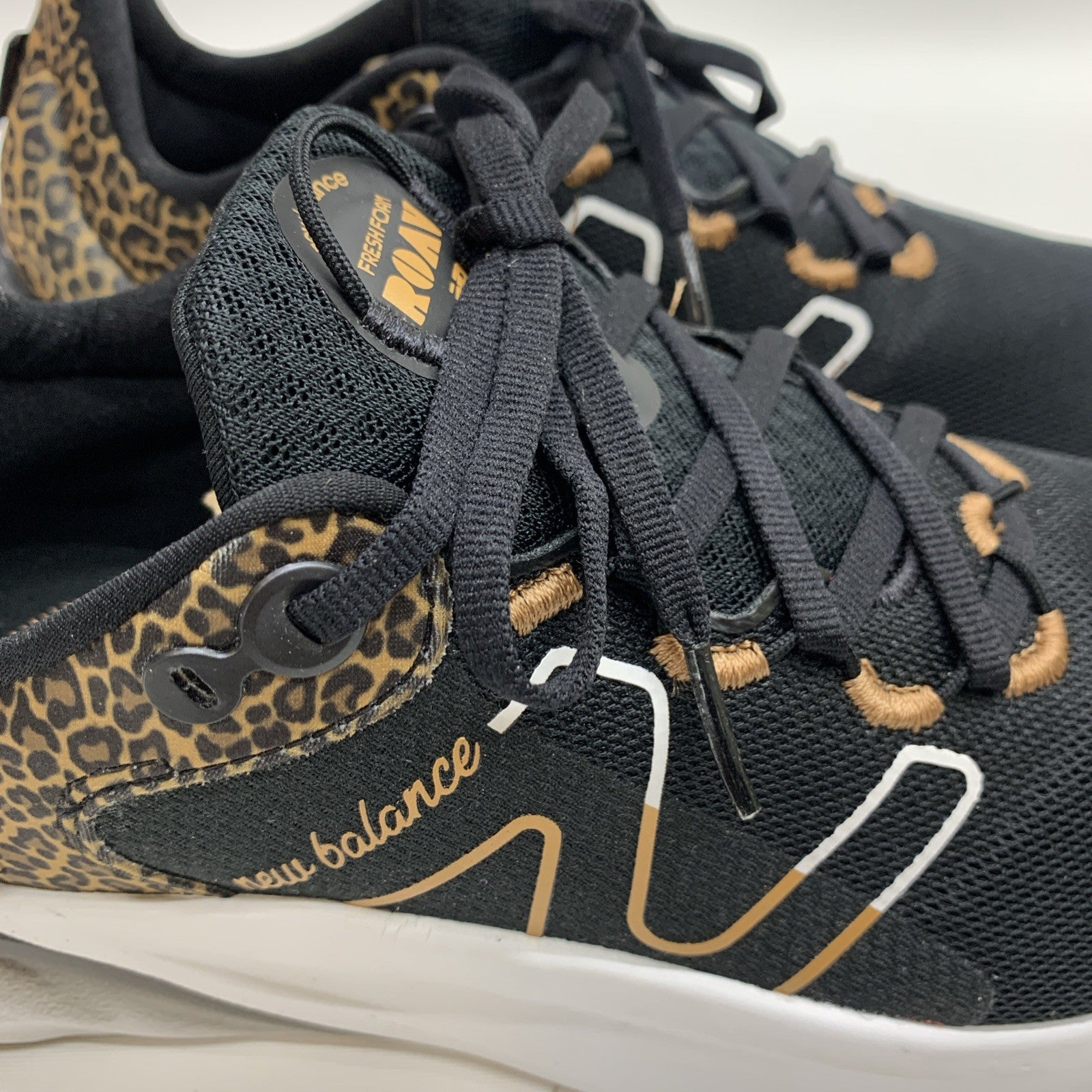 New Balance Women's Fresh Foam Roav V2 Sneaker Black /White/Leopard Print 7.5