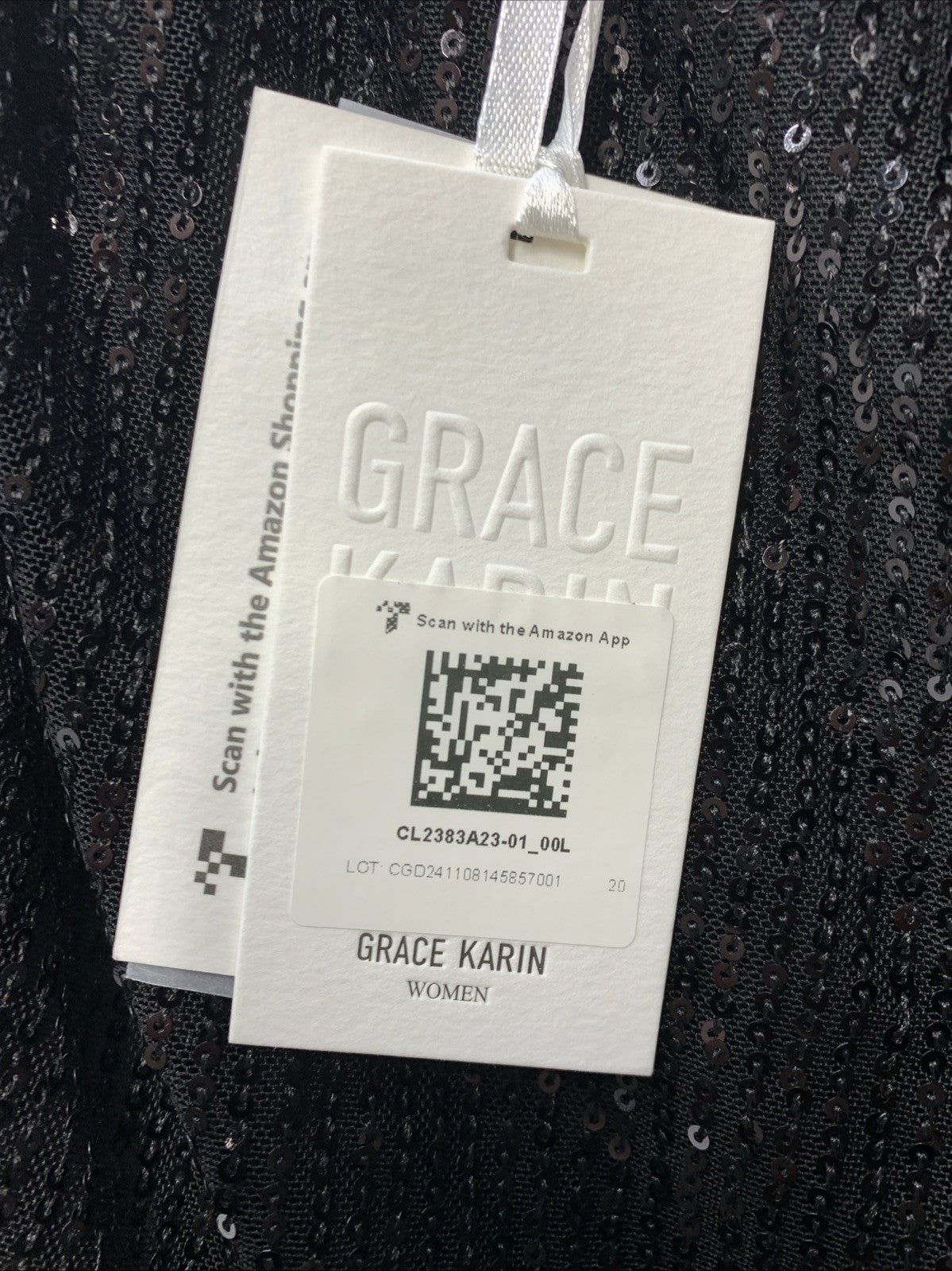 Black one-shoulder sequin top by Grace Karin, sparkly asymmetrical design, size L, women's fashion top.