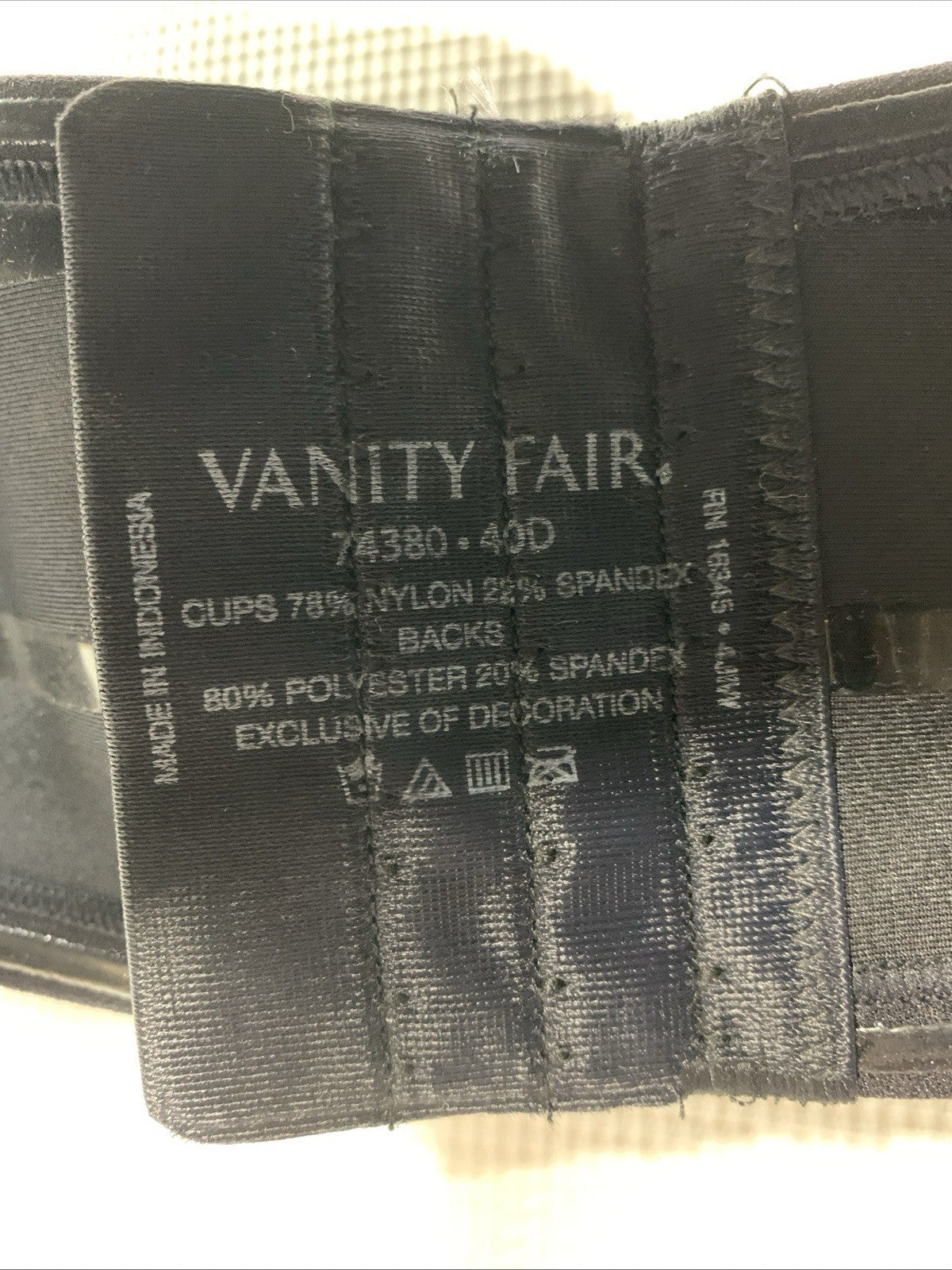 Black Vanity Fair women's strapless underwire bra with back support in size 40D, designed for comfort and a smooth fit.