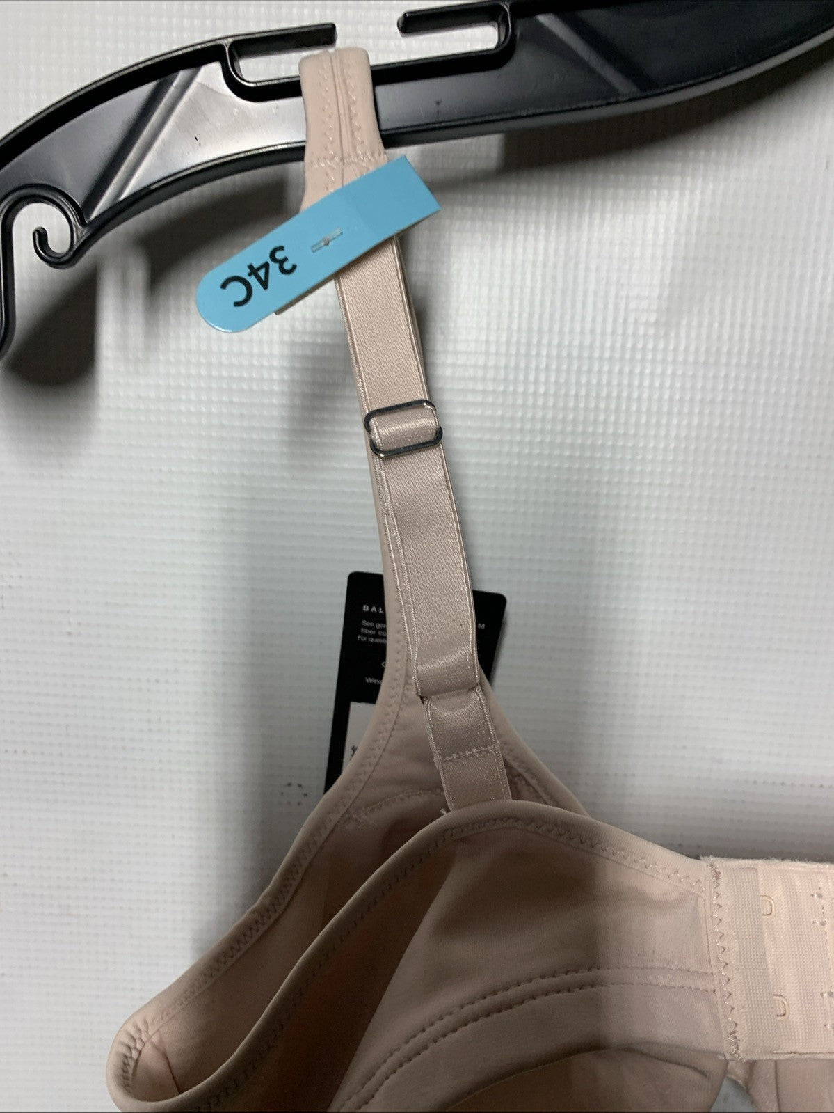 Bali women's minimizer bra with silky-smooth lining, underwire support, in 34C size, featuring comfortable design and beige color.