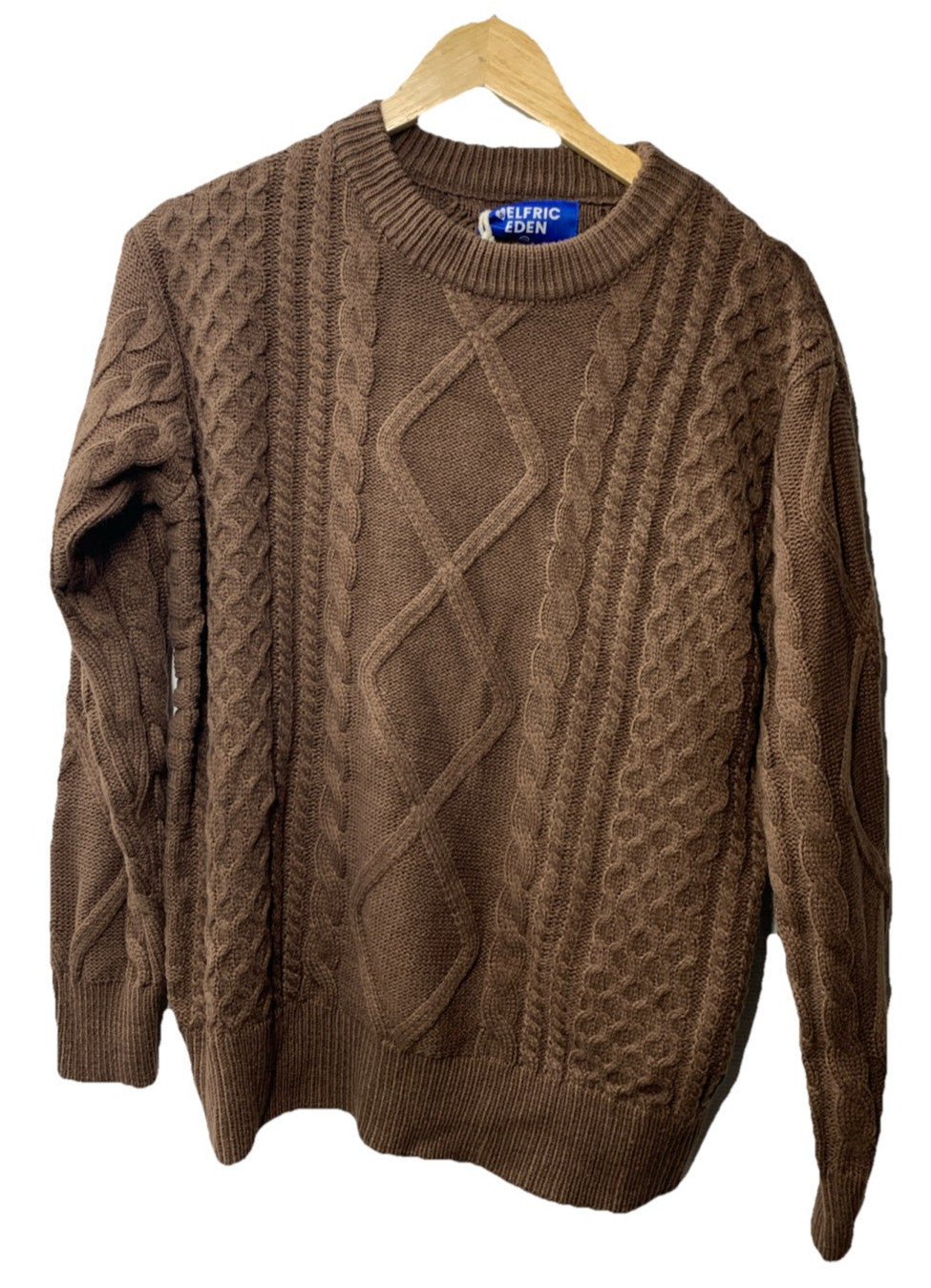 Brown Aelfric Eden women's oversized fisherman cable knit sweater with long sleeves, styled casually.