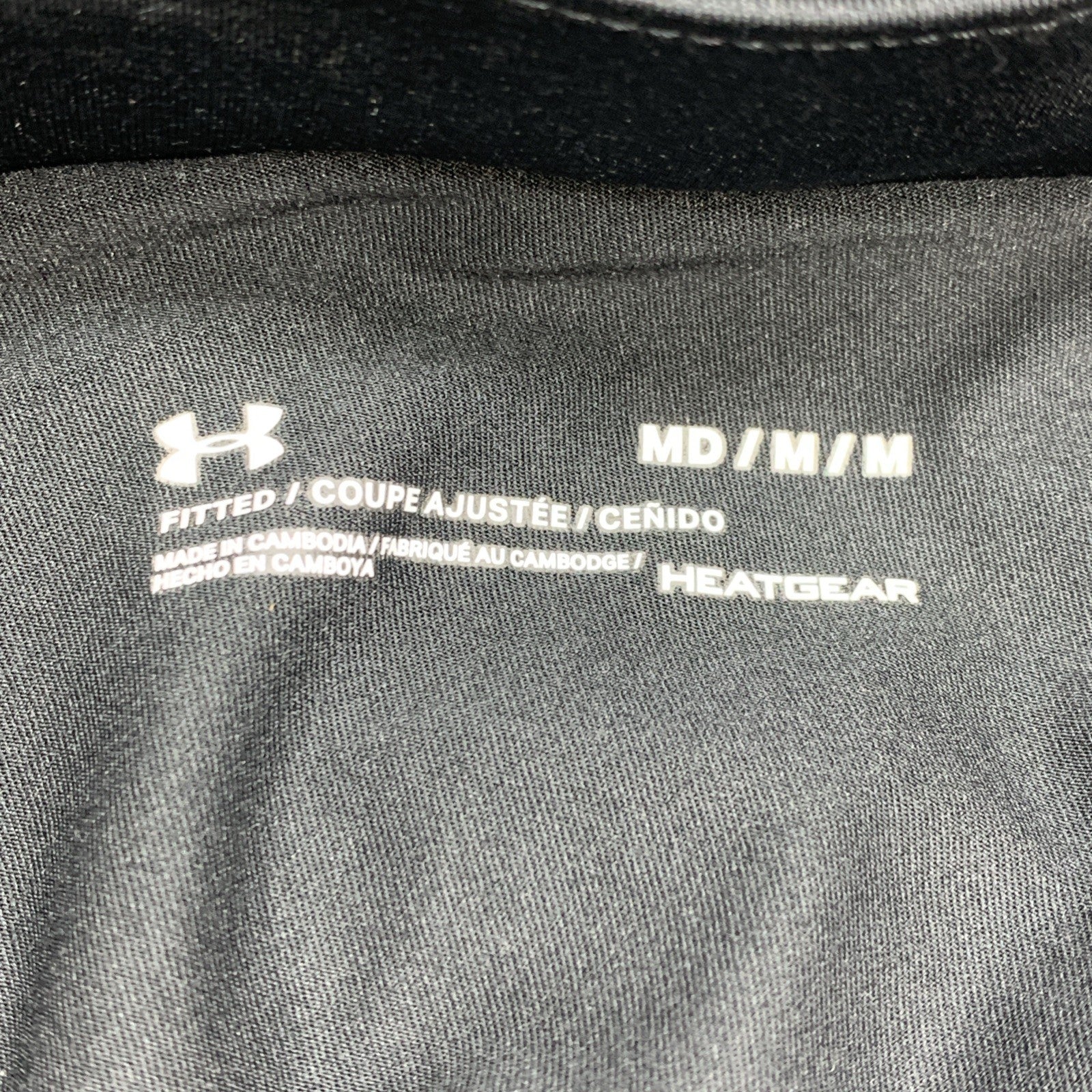 Black Under Armour Fly By 2.0 women's activewear shorts, fitted size M, designed for body building and workouts.