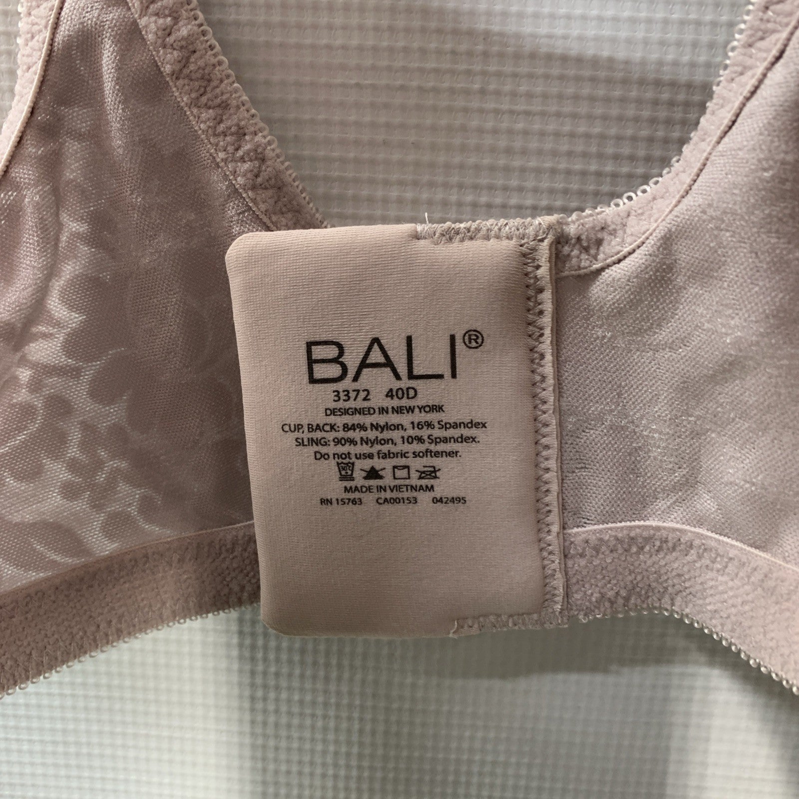 Bali women's double support wirefree T-shirt bra in size 40D, beige with smooth, seamless cups and spa closure.