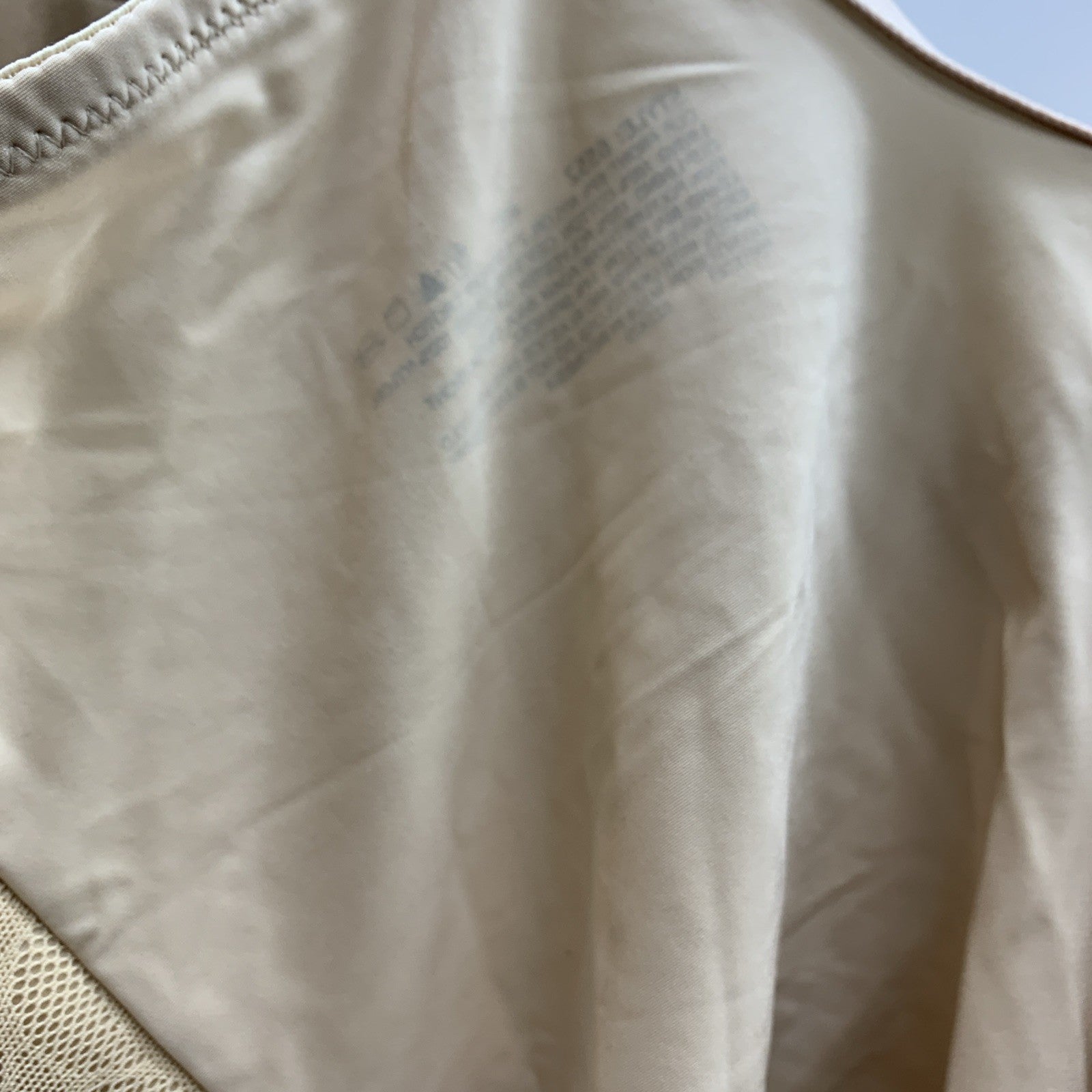 Bali Ultra Light Body Briefer Shaper with firm control, underwire, in size 40C, beige, worn by a woman for shaping and support