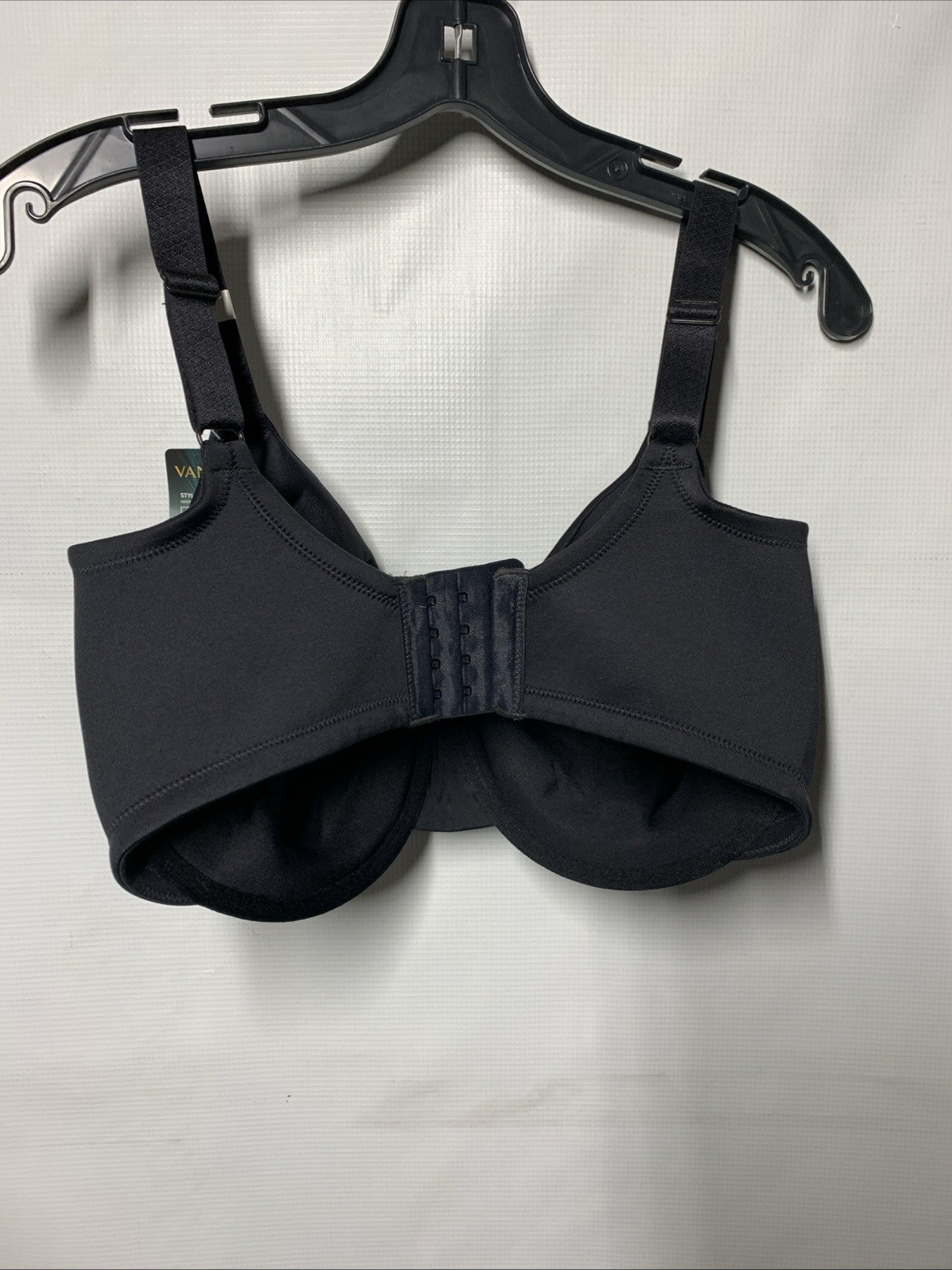 Black Vanity Fair 76080 women's underwire minimizer bra in 36H size, featuring smooth back design and supportive fit.