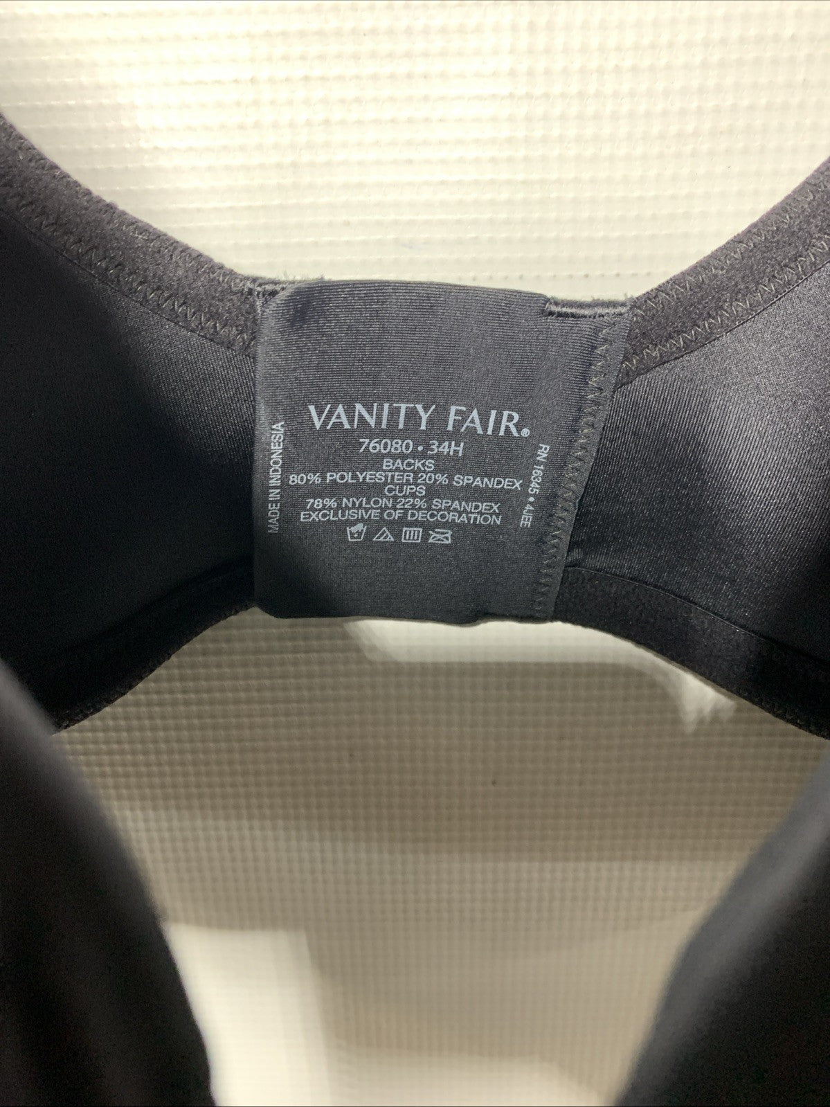 Black Vanity Fair 76080 Beauty Back Smoothing Full Figure Minimizer Bra in size 34H, showing padded cups and supportive design.