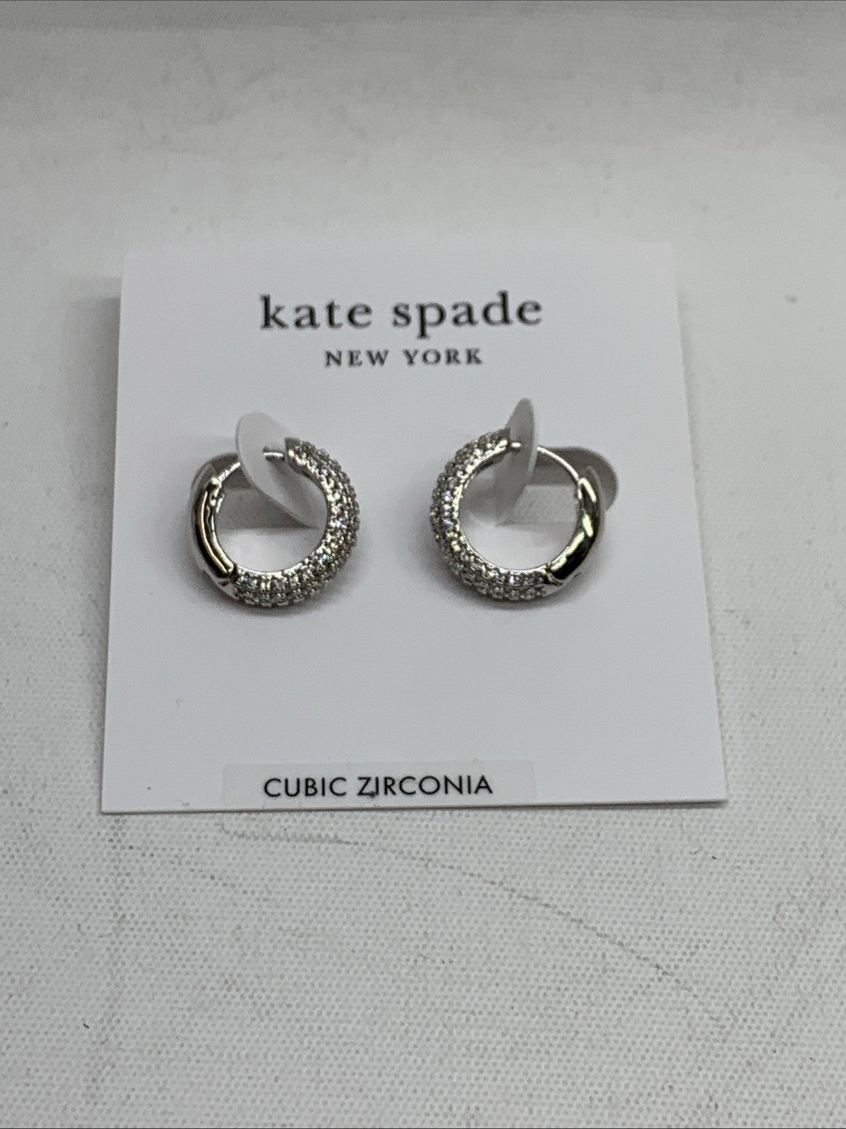 Kate Spade New York WBRUH996-SLVR Silver Tone Small Pavé Huggie Hoop Earrings