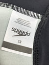 Black Speedo women's one-piece swimsuit with high neck and contemporary cut, size 12, ideal for swimming and water activities.