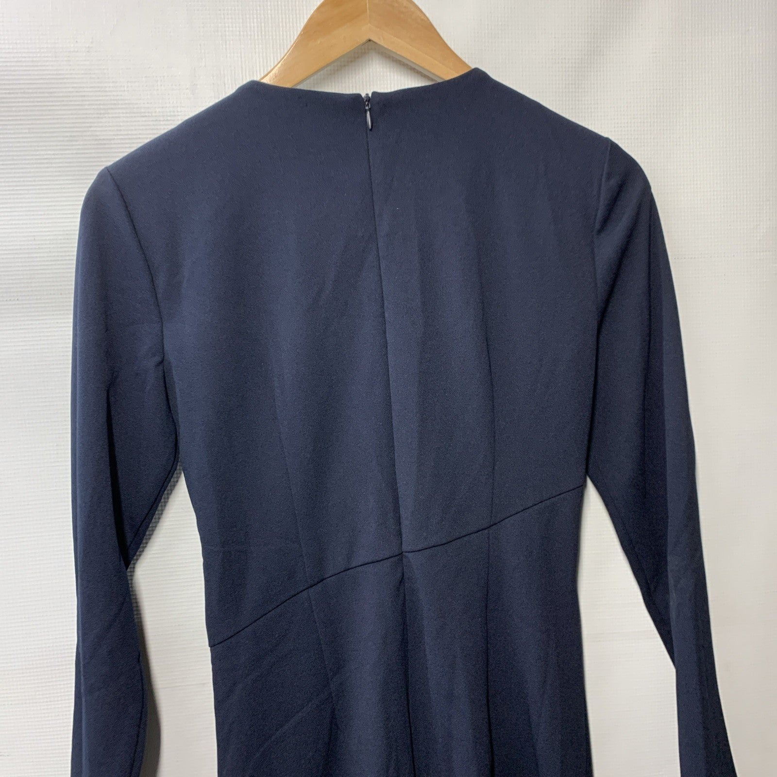 Navy blue Donna Morgan women's long sleeve dress, size 4, suitable for formal or business casual occasions.