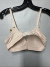 Warner's Women's WR1269-682 smooth lightly lined wireless comfort bra in size 36A, beige with soft fabric and adjustable straps.