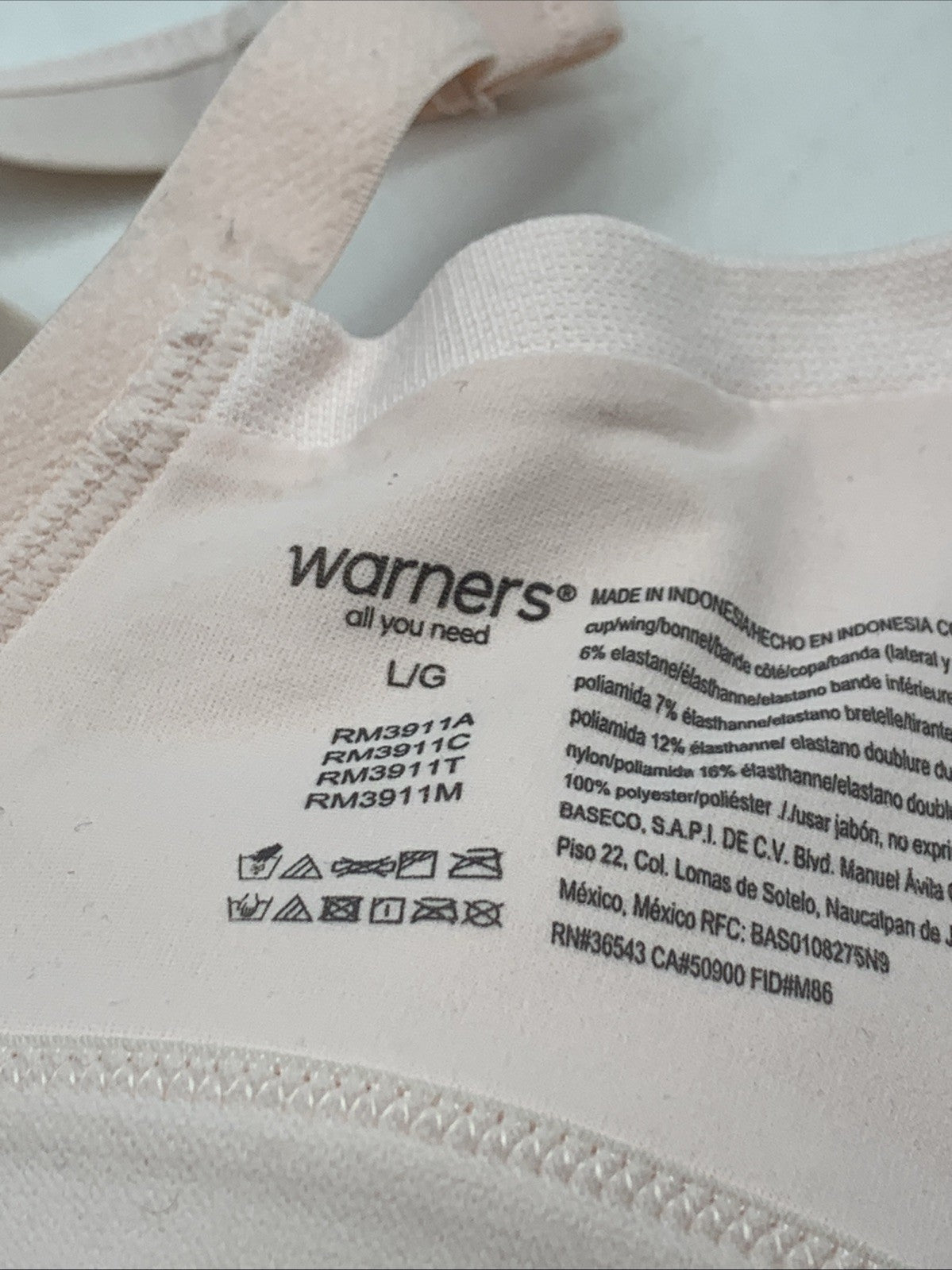 Warners women's large light beige wireless seamless bra with lightly lined cups, from The Family Flips, in a comfortable, smooth fit.