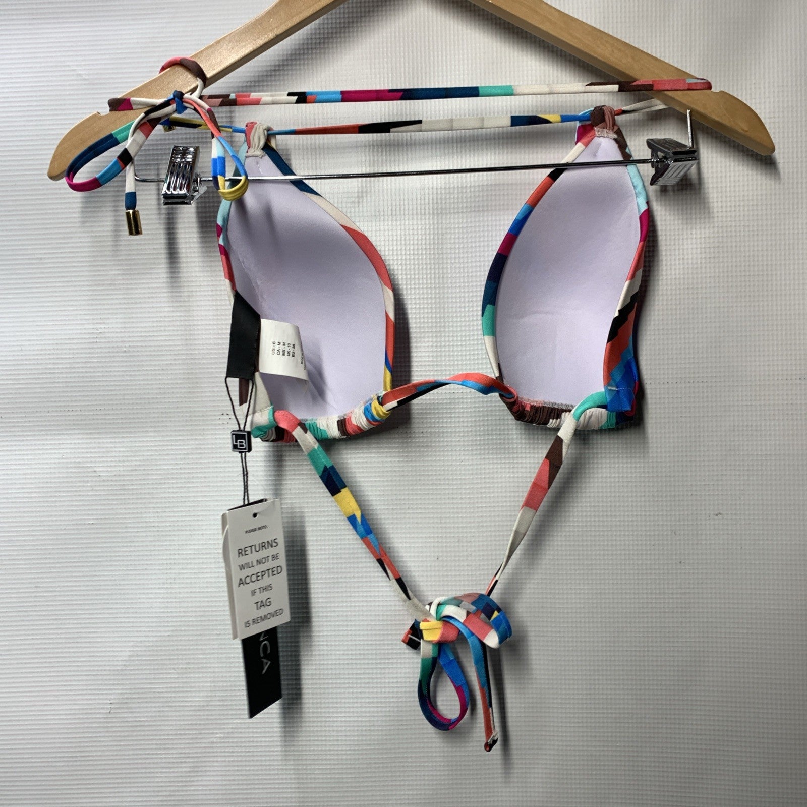 La Blanca women's Slice printed halter bikini top in size 6 with vibrant swimwear pattern, supportive halter style, and adjustable straps.