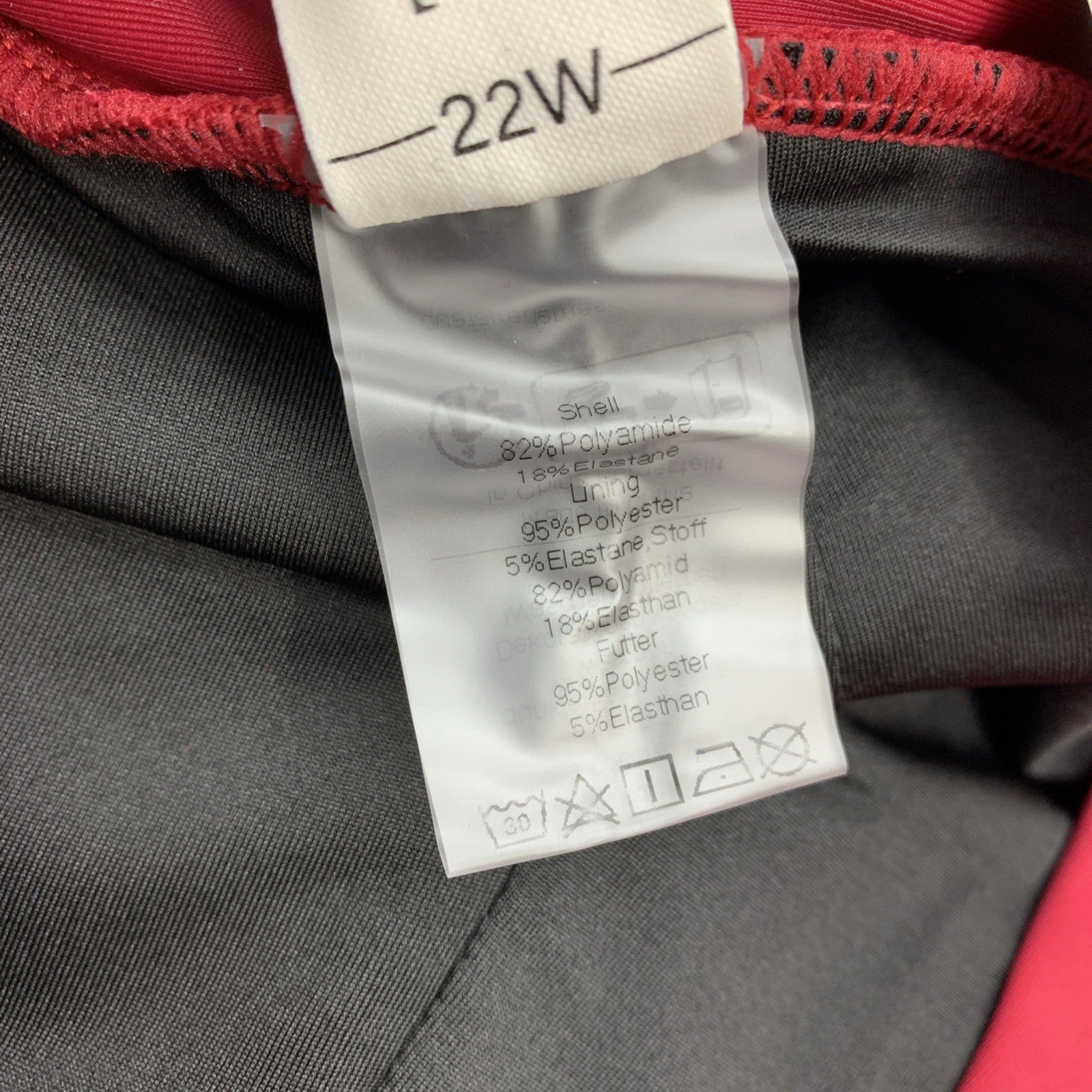 Plus size red high-waisted swim skirt by Hanna Nikole, suitable for women’s swimwear, size 22W, from The Family Flips.