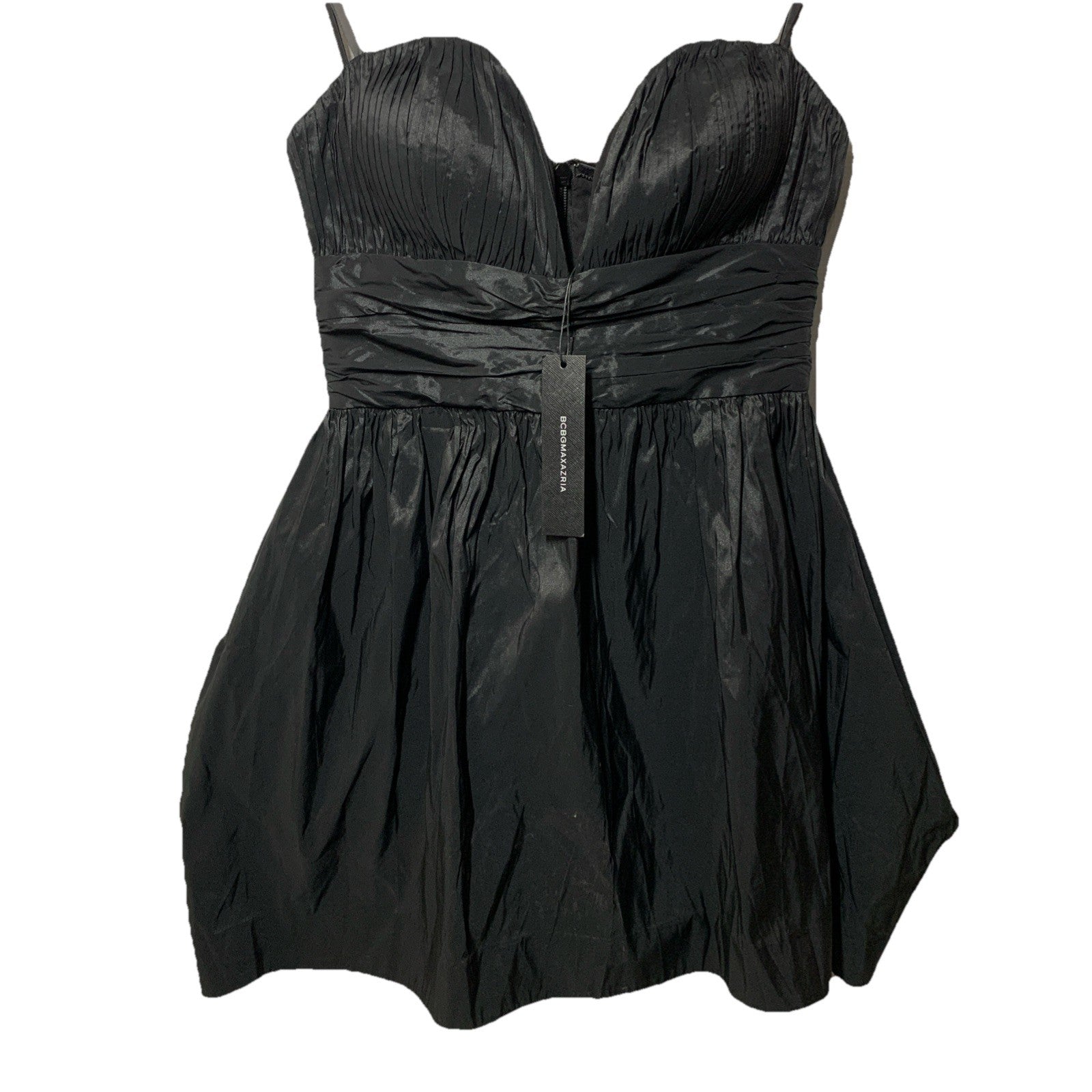 Black BCBGMAXAZRIA strapless mini dress with ruched details, perfect for evening wear, size 6, styled on a hanger.